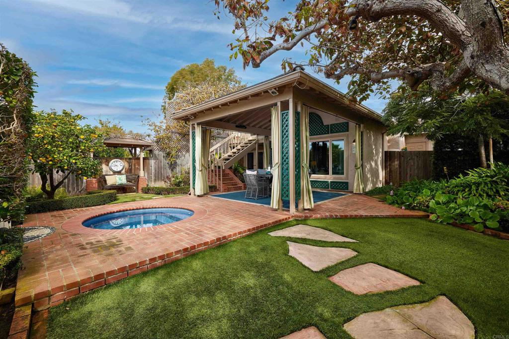 219 Calle De Sereno Encinitas, CA 92024 - Photo 36 of 43 a view of a house with backyard and porch