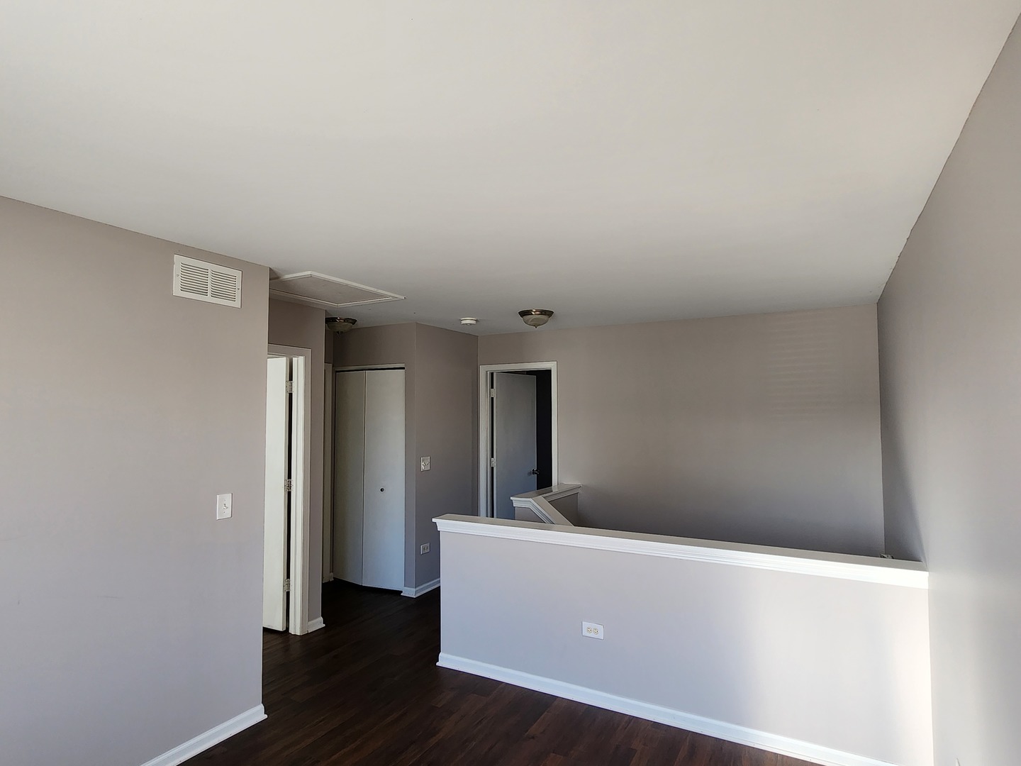 4228 Cummins Street Plano, IL 60545 - Photo 9 of 14 wooden floor and chair in a room