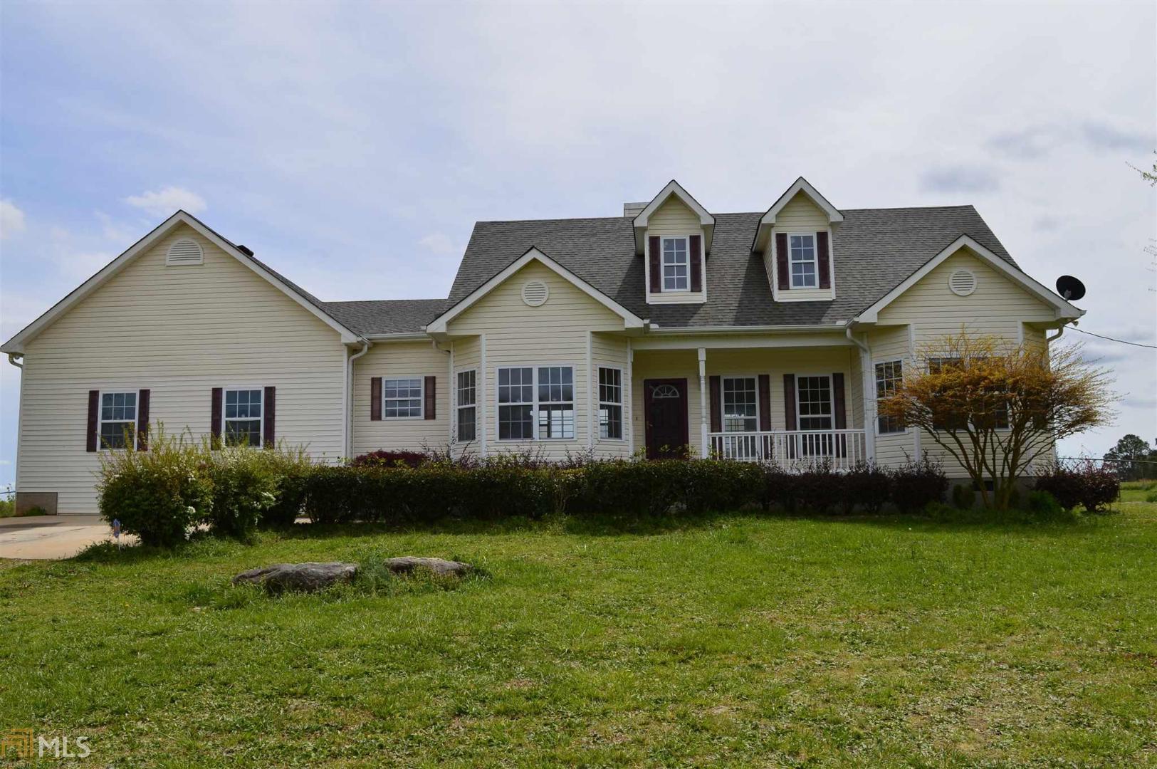 647 Highfalls Park Road Barnesville, GA 30204 - Photo 1 of 1 a front view of a house with garden