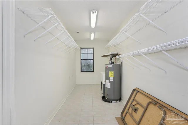 a view of a kitchen with a sink and a window