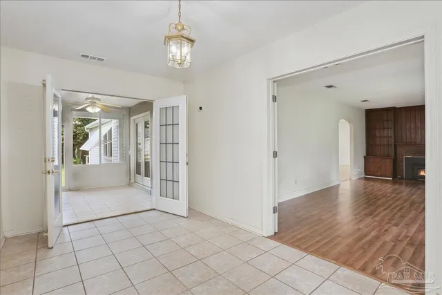 a view of park with large trees