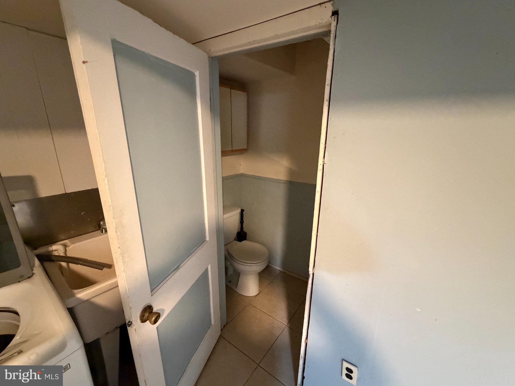 7216 Conley Street Baltimore, MD 21224 - Photo 10 of 14 Cozy corner with essential amenities.
