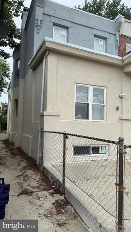 a white building with a outdoor space