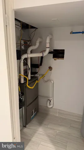 a view of storage and utility room