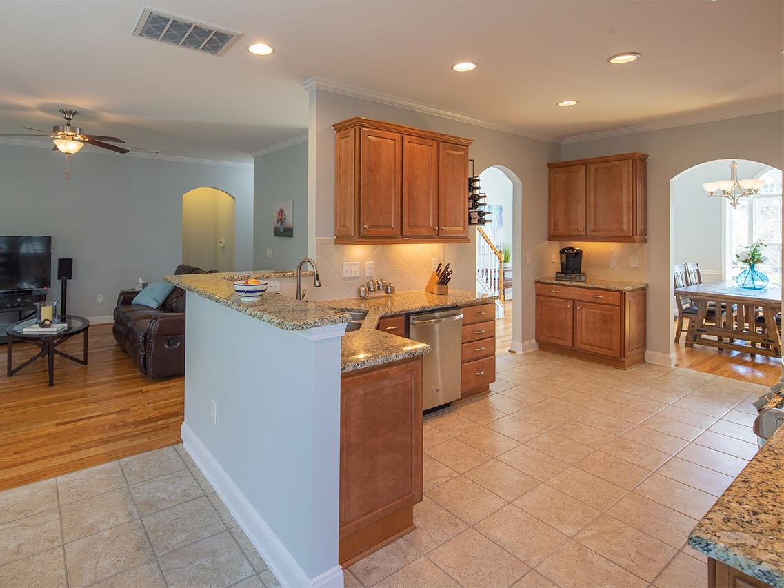 4 Hidden Ridge Court Durham, NC 27707 - Photo 27 of 27 The family room is open to the kitchen, perfect for entertaining. Open floor plan