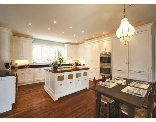 Undisclosed Address Old Greenwich, CT 06870 - Photo 5 of 8 a kitchen with a sink stove and cabinets