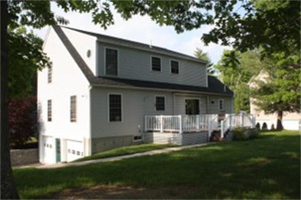 230 Fitch Road Clinton, MA 01510 - Photo 7 of 30 a front view of a house with a garden