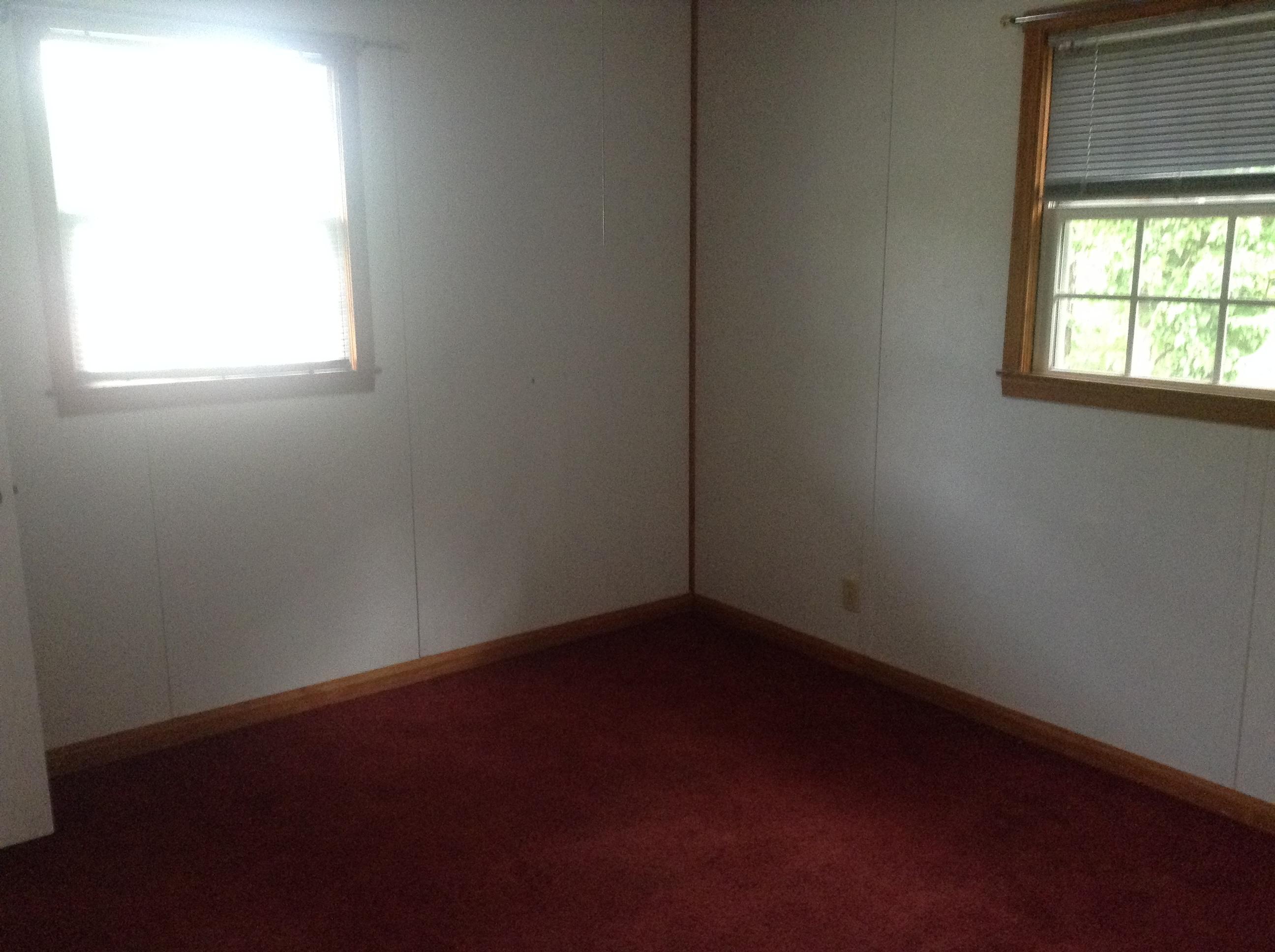 640 Power Dam Road Rocky Mount, VA 24151 - Photo 4 of 9 an empty room with a window