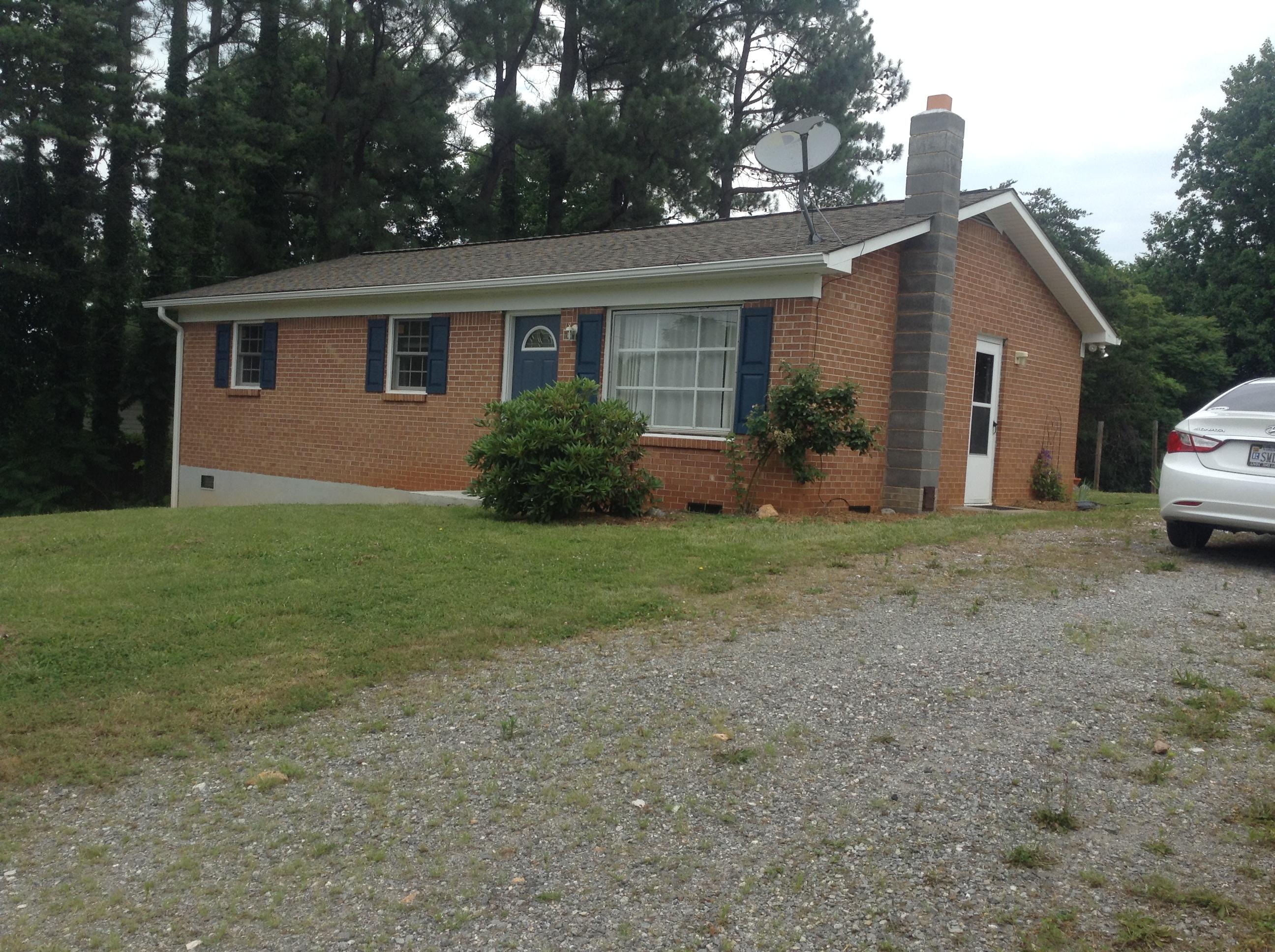 640 Power Dam Road Rocky Mount, VA 24151 - Photo 8 of 9 a view of a house with backyard