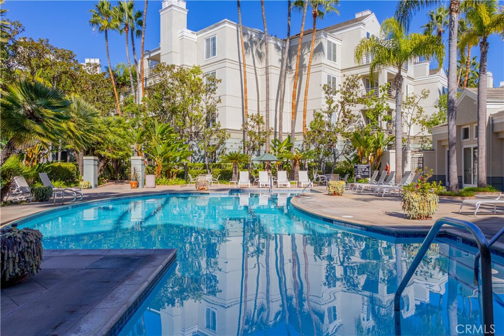 2233 Martin, Unit 108 Irvine, CA 92612 - Photo 23 of 31 a view of swimming pool with outdoor seating and plants