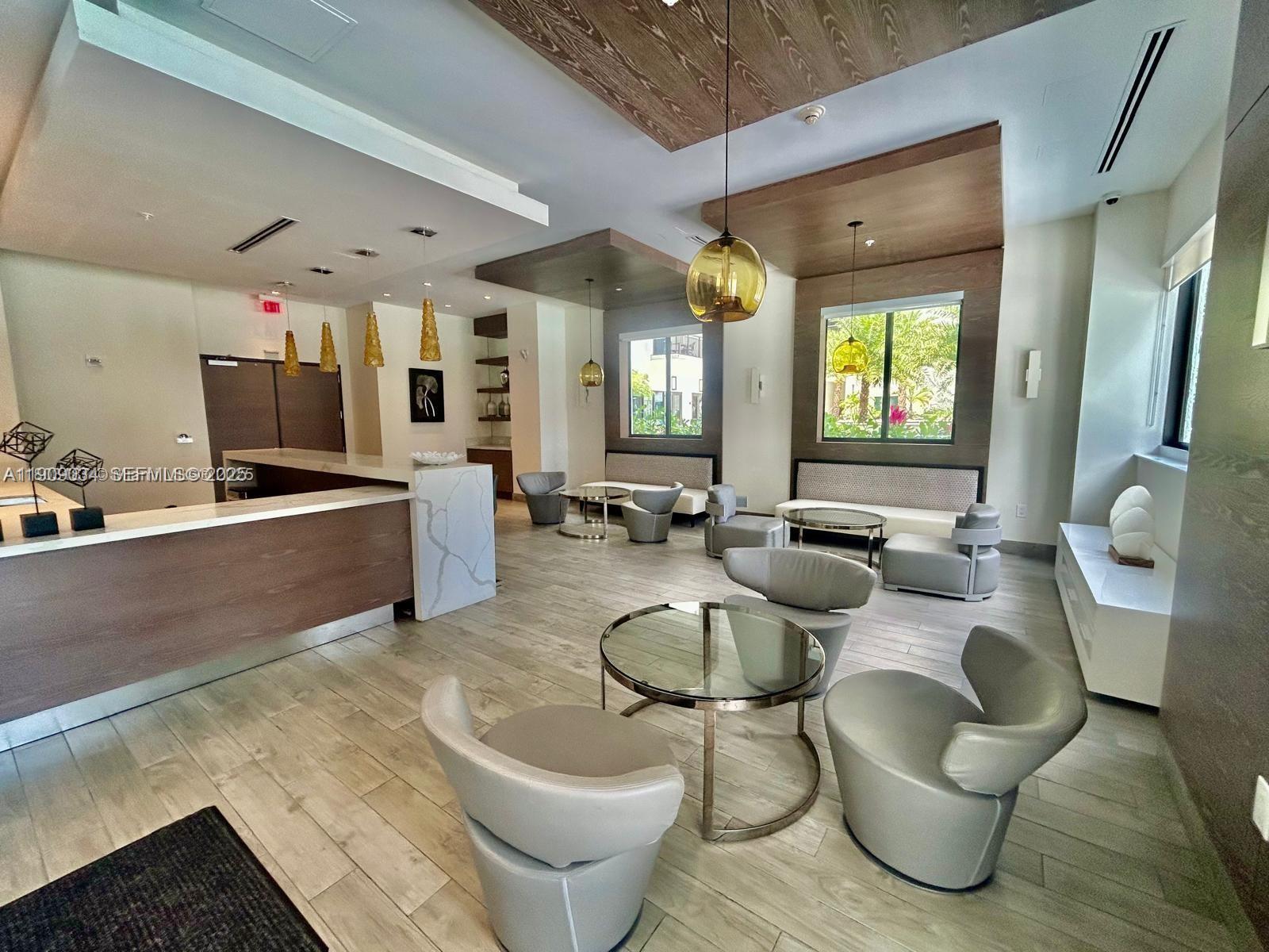 999 Southwest 1st Avenue, Unit 3004 Miami, FL 33130 - Photo 26 of 36 a living room with furniture and a large window