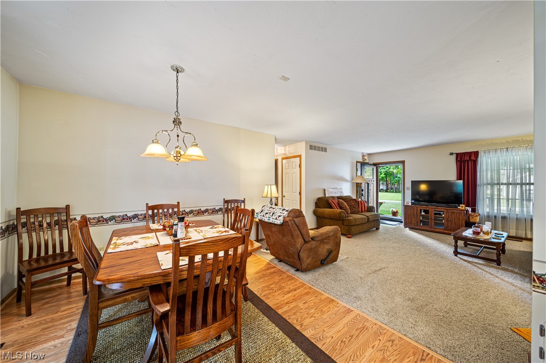 431 Ansel Road Geneva, OH 44041 - Photo 17 of 35 View of wood floored dining space