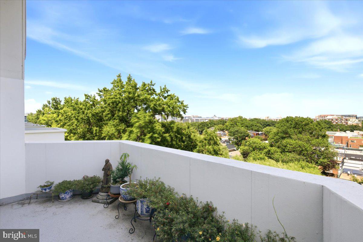 700 7th Street Southwest, Unit 827 Washington, DC 20024 - Photo 19 of 32 Serene balcony with lush views.