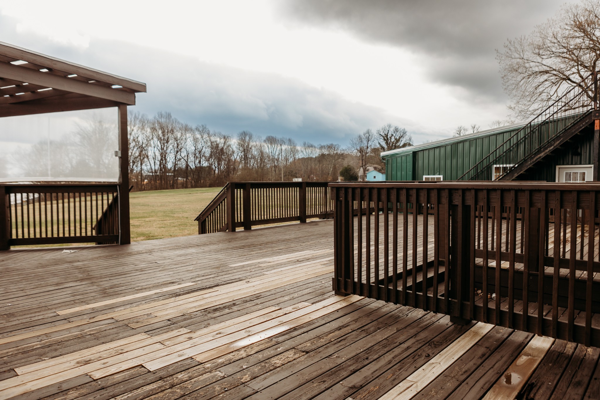 817 Interstate Drive Manchester, TN 37355 - Photo 21 of 38 a view of balcony with wooden floor