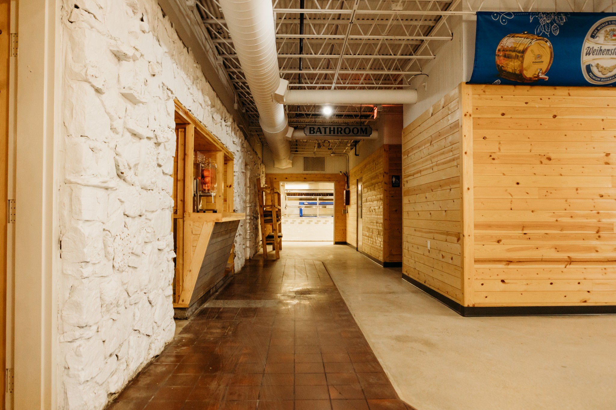 817 Interstate Drive Manchester, TN 37355 - Photo 6 of 38 a view of a hallway with wooden walls and windows