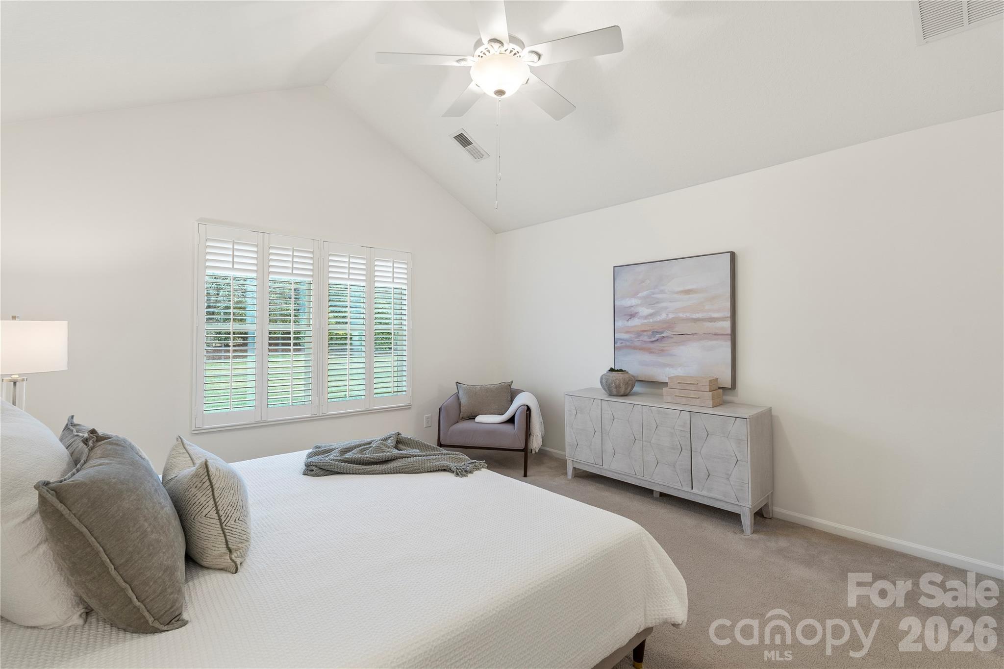 2444 Coltsview Lane Matthews, NC 28105 - Photo 21 of 43 a bedroom with bed and window