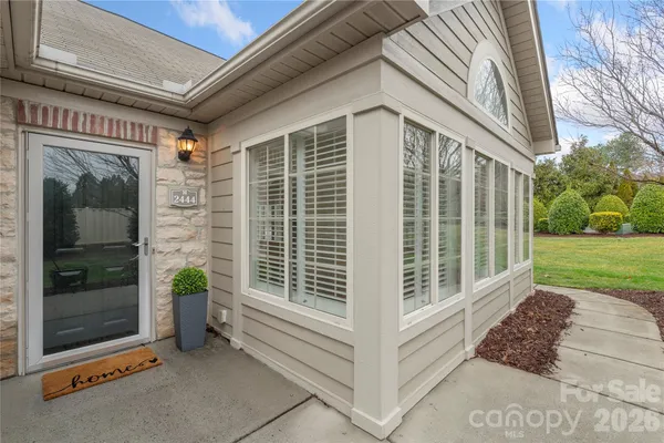 a view of a house with a garden