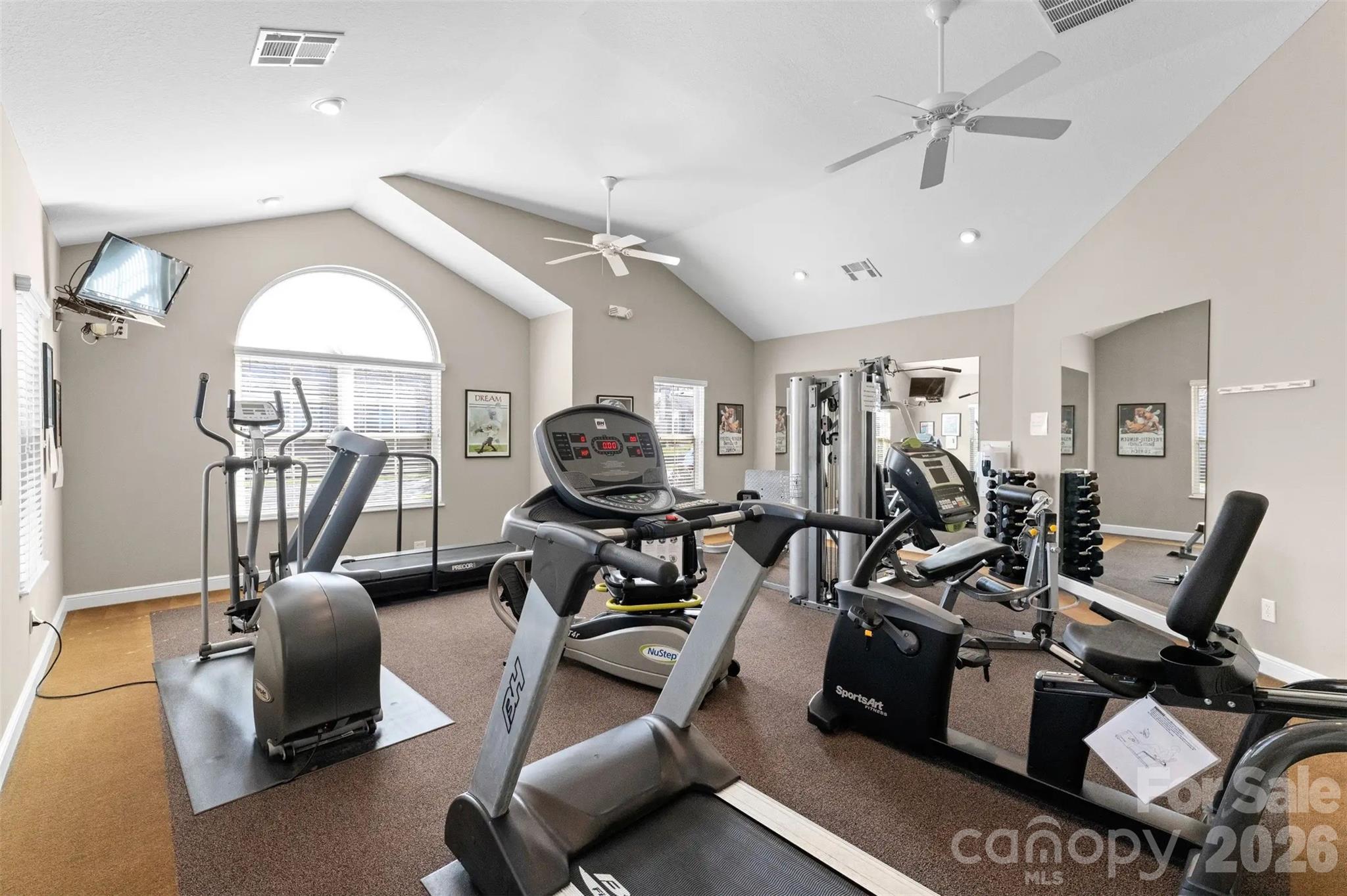 2444 Coltsview Lane Matthews, NC 28105 - Photo 39 of 43 a view of a room with gym equipment