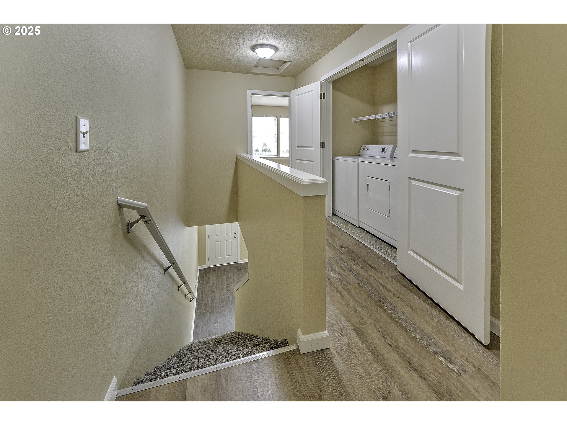 18483 Southwest Annamae Lane Beaverton, OR 97003 - Photo 14 of 23 a view of an entryway with wooden floor