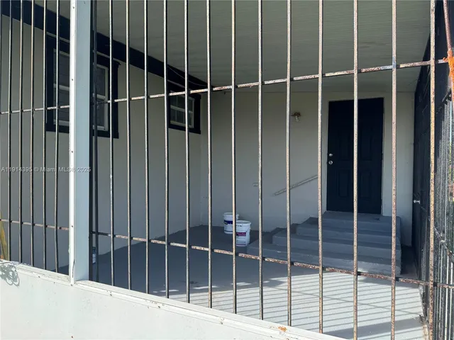 a view of a big yard with a house