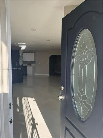 a view of empty room with empty racks