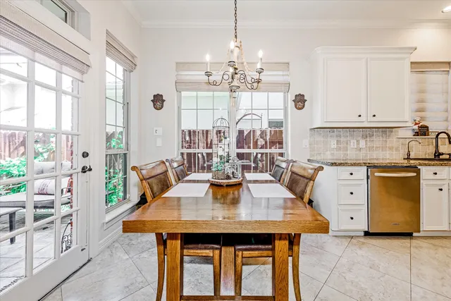 a spacious bedroom with a bed and wooden floor