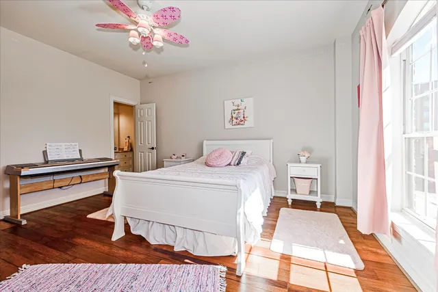 a room with toys and dresser