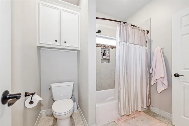 a outdoor space with patio the couches and a potted plant on a table