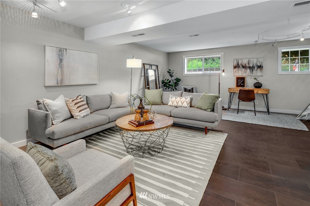 13833 Southeast 142nd Street Renton, WA 98059 - Photo 15 of 22 a living room with furniture and wooden floor
