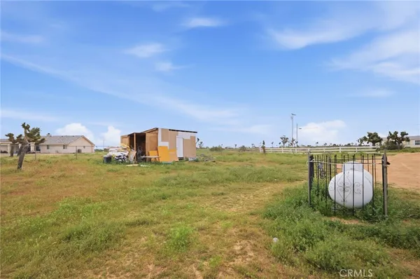 a view of a lake with couches and city view
