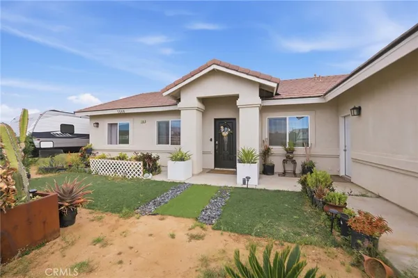 a view of a house with a patio