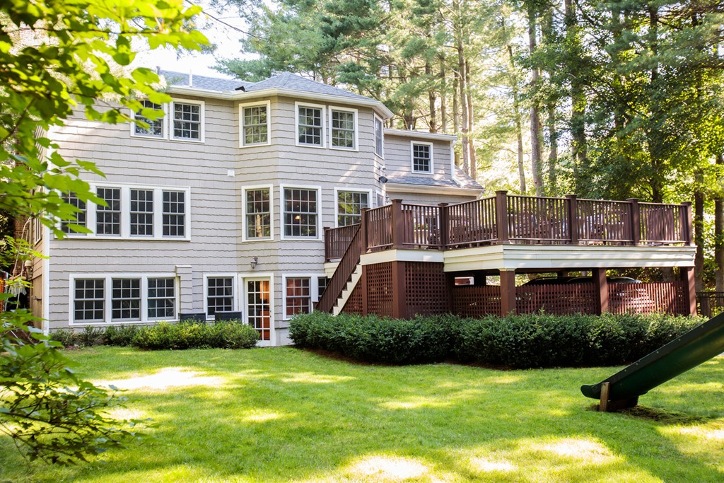 61 Windsor Road Wellesley, MA 02481 - Photo 29 of 30 a front view of a house with a yard