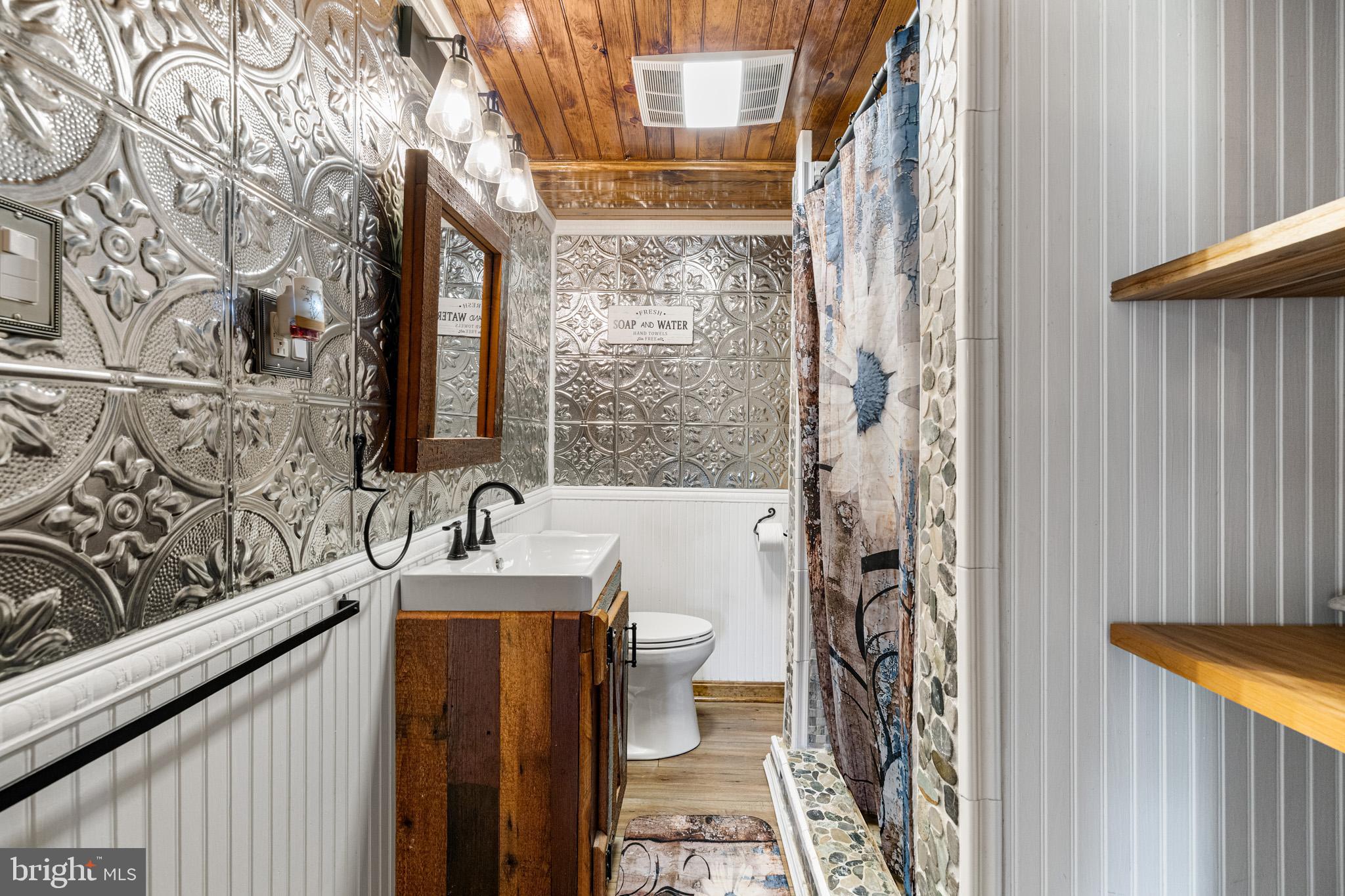 989 Swover Creek Road Edinburg, VA 22824 - Photo 35 of 132 Downstairs Bathroom