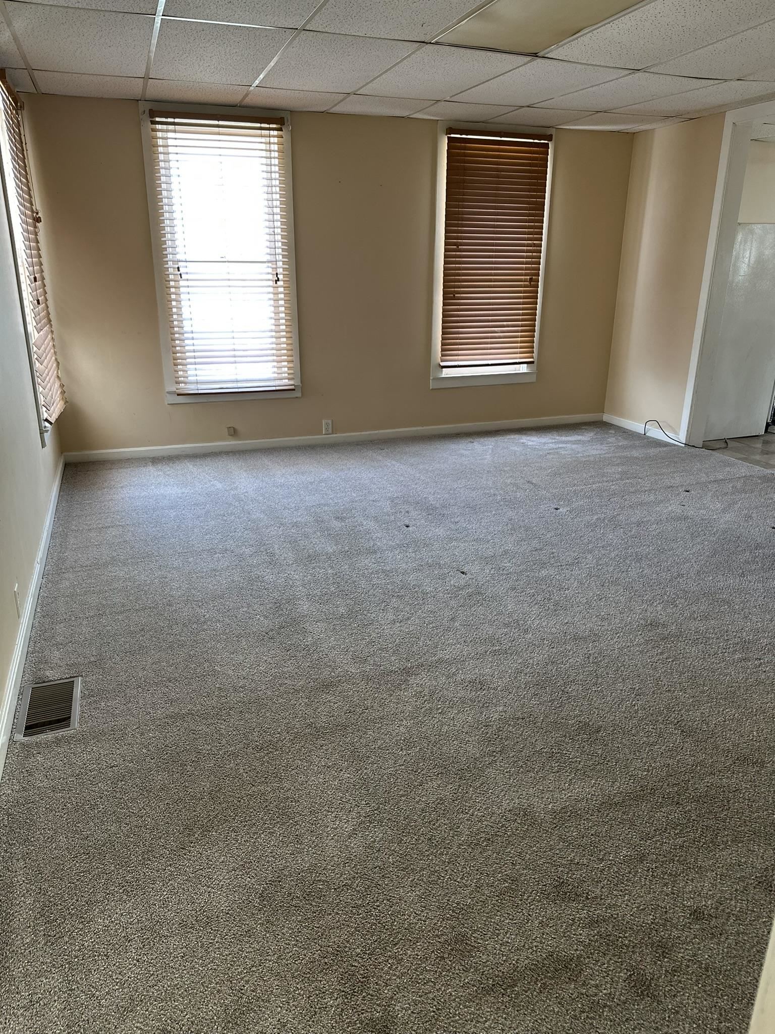 1109 South Carroll Avenue Freeport, IL 61032 - Photo 12 of 34 an empty room with windows