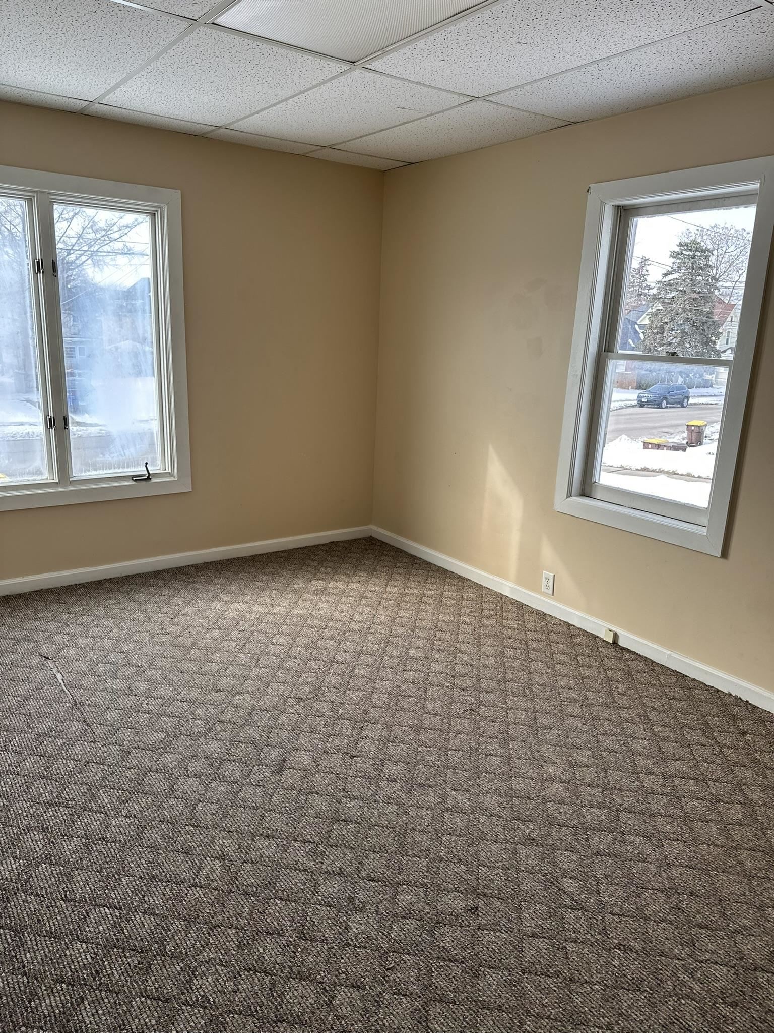 1109 South Carroll Avenue Freeport, IL 61032 - Photo 4 of 34 an empty room with a window