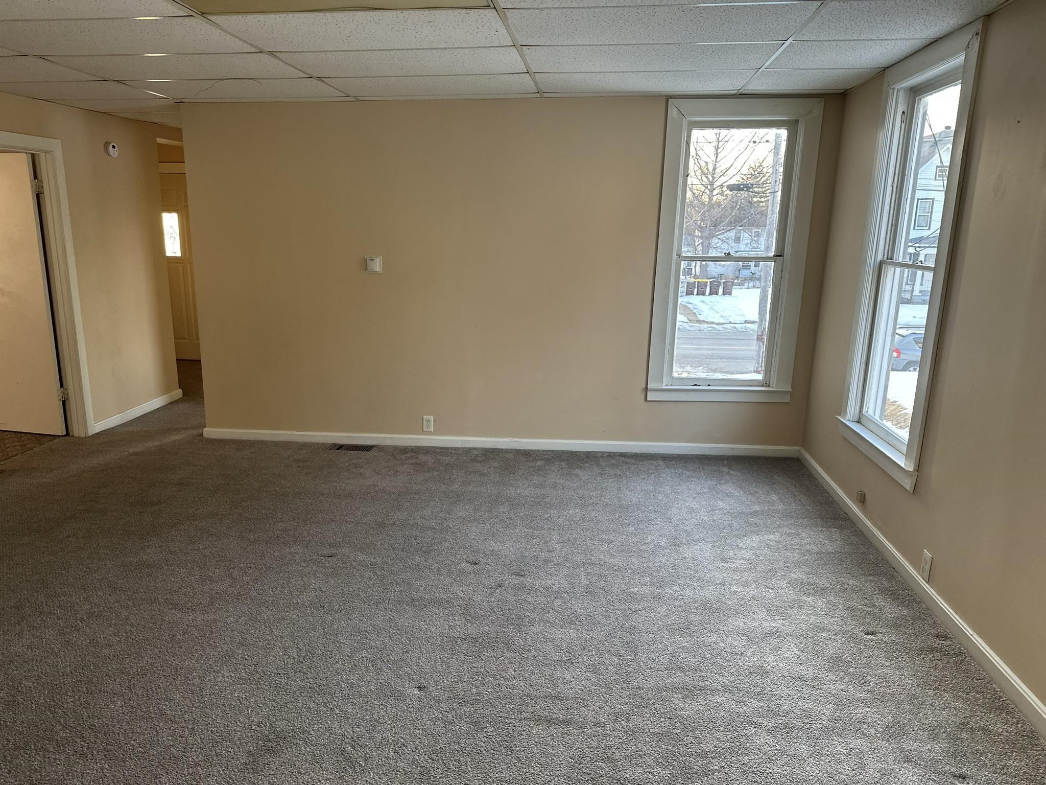 1109 South Carroll Avenue Freeport, IL 61032 - Photo 7 of 34 an empty room with windows