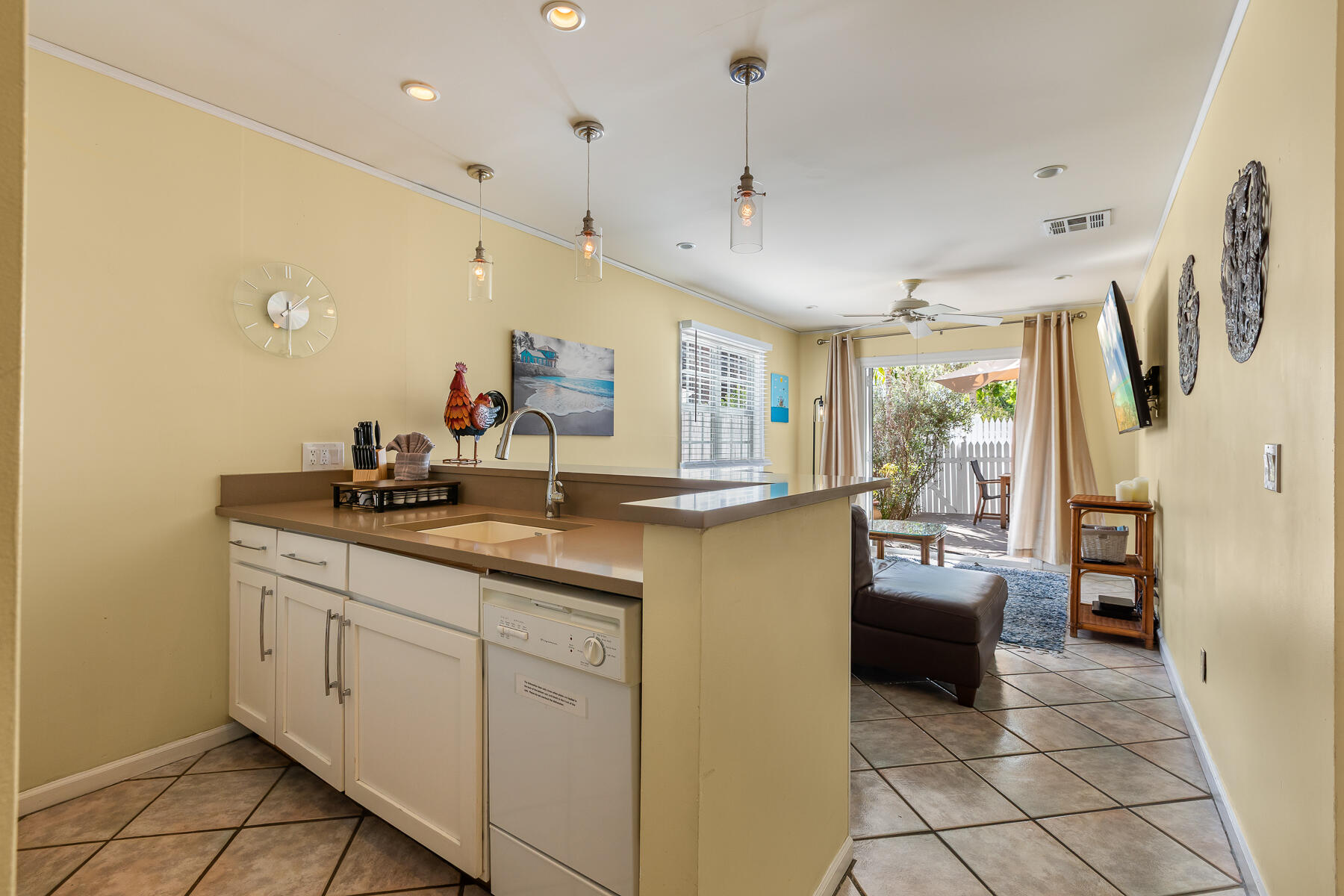 620 Thomas Street, Unit 175 Key West, FL 33040 - Photo 8 of 30 a kitchen with counter top space and stainless steel appliances