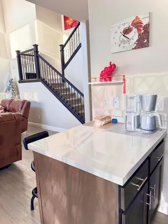 a living room with furniture and a table