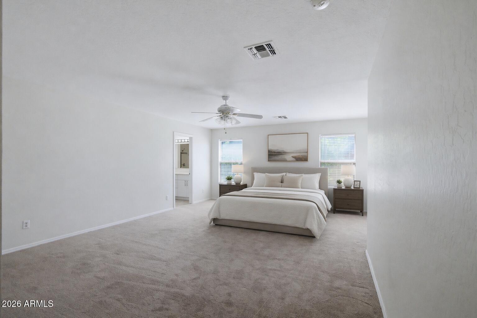 2933 West Maldonado Road Phoenix, AZ 85041 - Photo 13 of 27 Staged- Main Bedroom