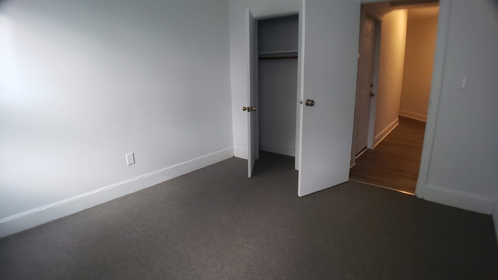 25 Chester Street, Unit 3 Boston, MA 02134 - Photo 11 of 13 an empty room with windows