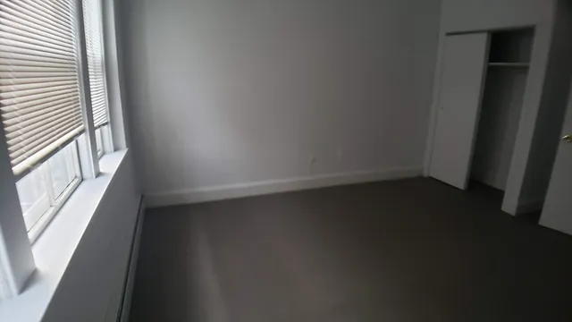 an empty room with a window