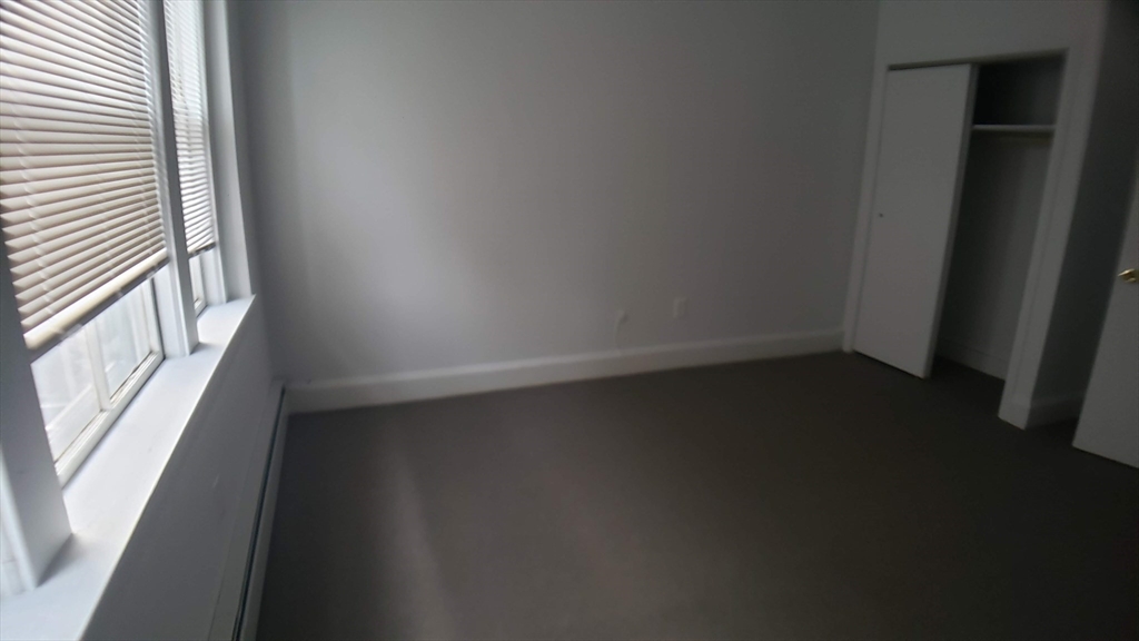 25 Chester Street, Unit 3 Boston, MA 02134 - Photo 8 of 13 an empty room with a window