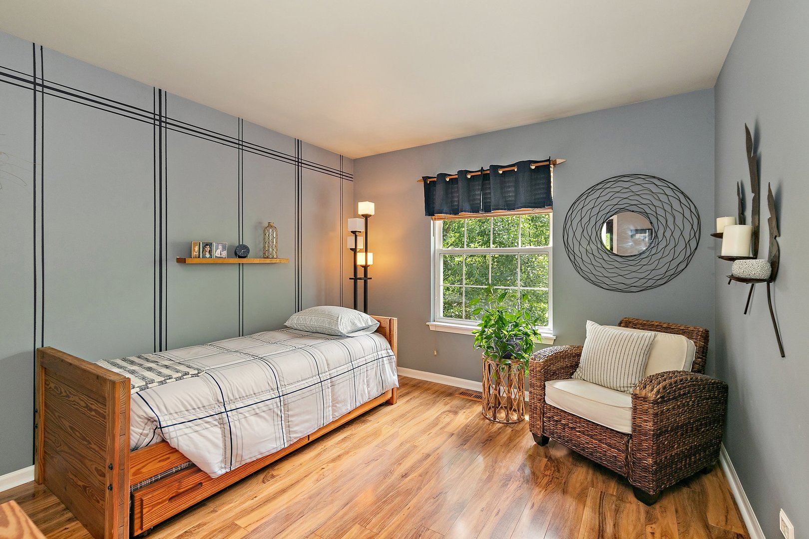 3908 Farmstead Road Carpentersville, IL 60110 - Photo 22 of 47 a bedroom with a bed couch and a window