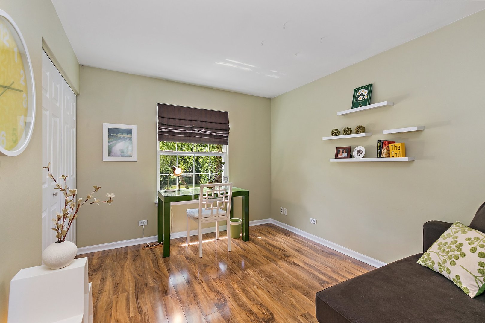 3908 Farmstead Road Carpentersville, IL 60110 - Photo 23 of 47 a bedroom with a bed and a window