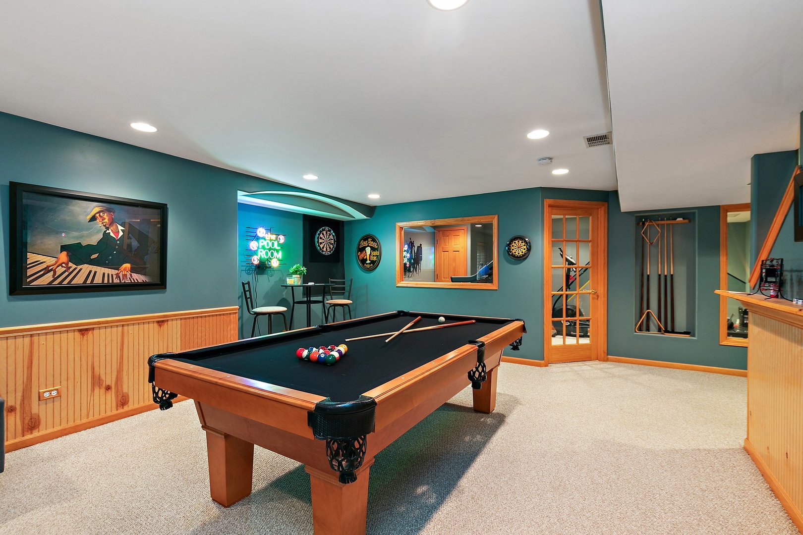 3908 Farmstead Road Carpentersville, IL 60110 - Photo 28 of 47 a living room with pool table and a flat screen tv
