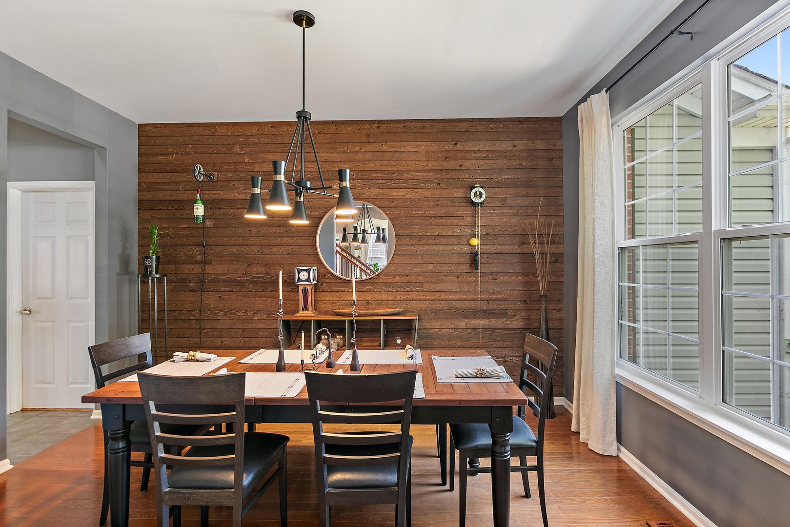 3908 Farmstead Road Carpentersville, IL 60110 - Photo 7 of 47 a view of a dining room with furniture window and wooden floor