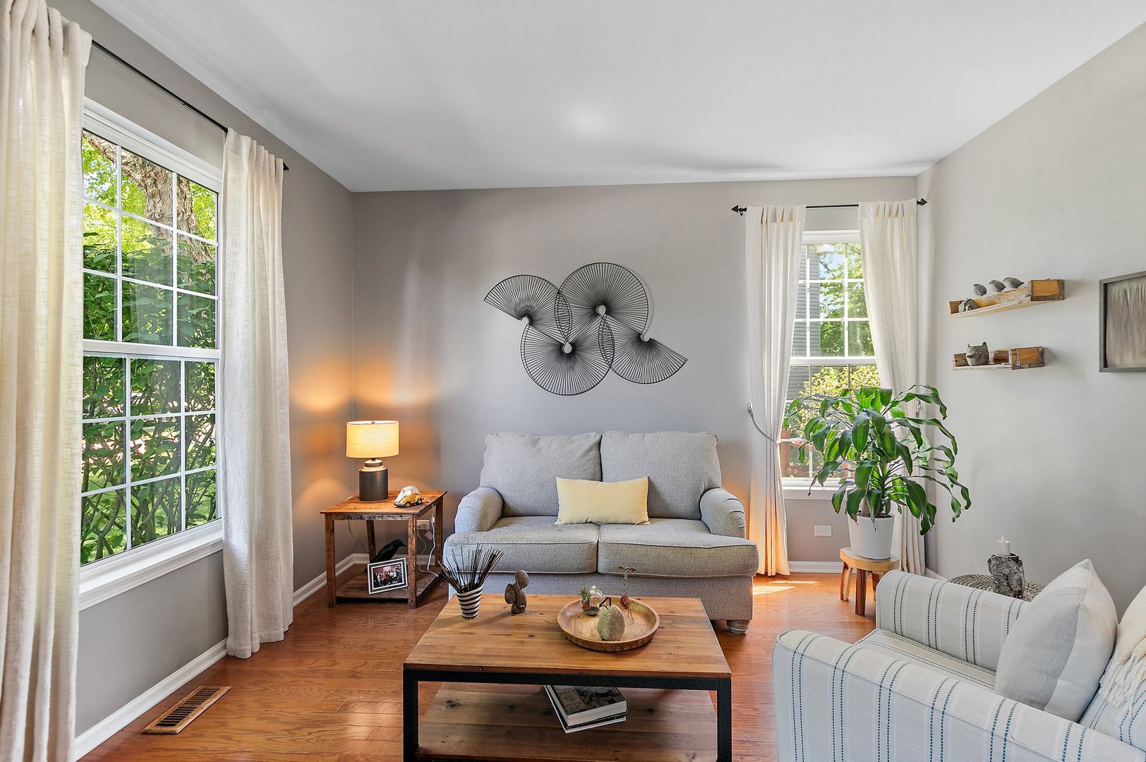 3908 Farmstead Road Carpentersville, IL 60110 - Photo 8 of 47 a living room with furniture and a large window