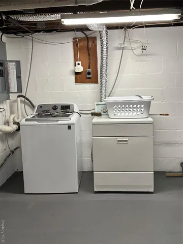a utility room with dryer and washer