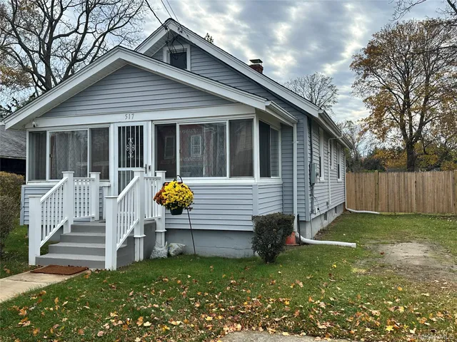 a house view with a garden space