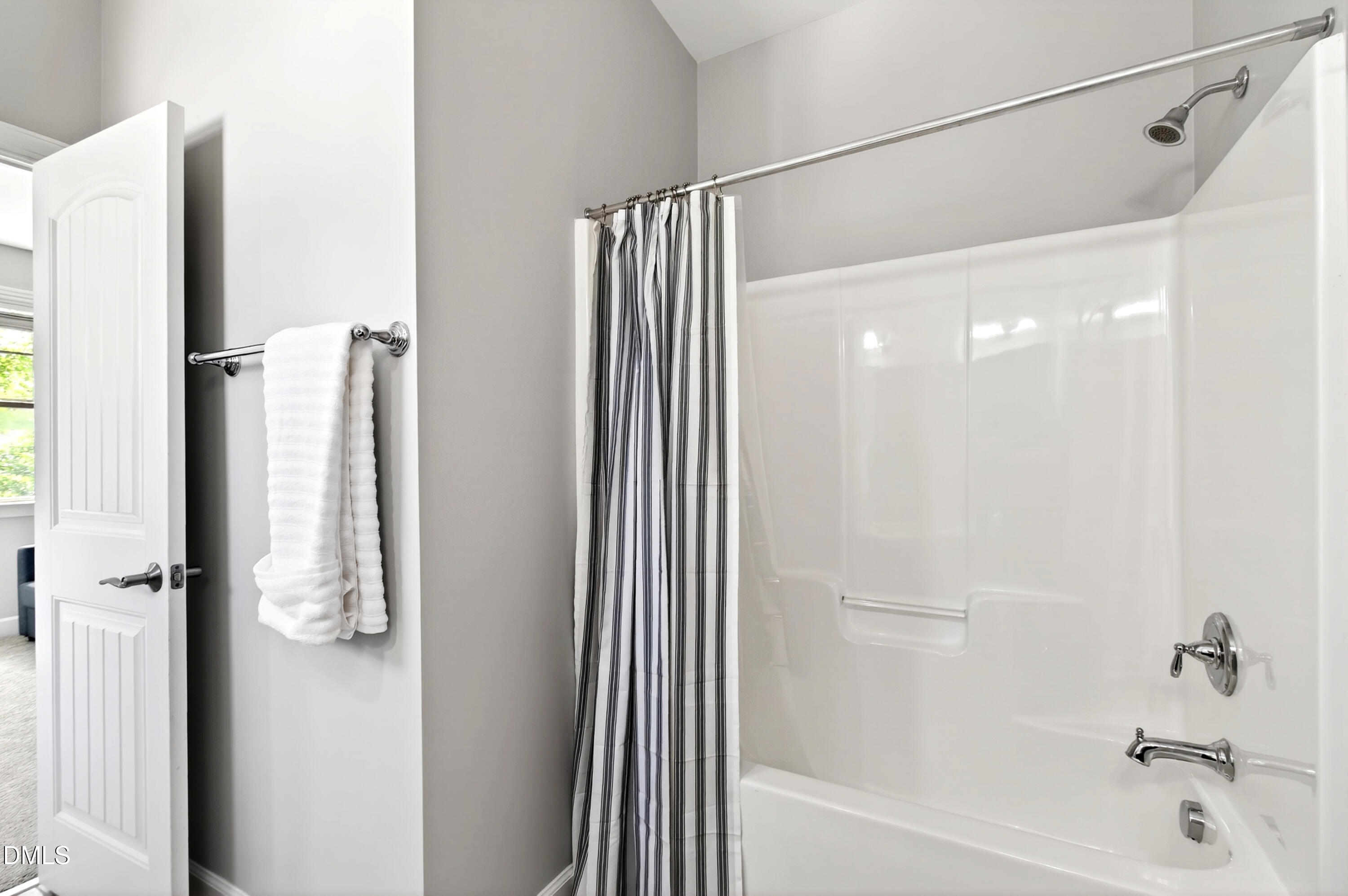 313 Karpen Lane Cary, NC 27519 - Photo 44 of 86 a bathroom with a shower and a tub